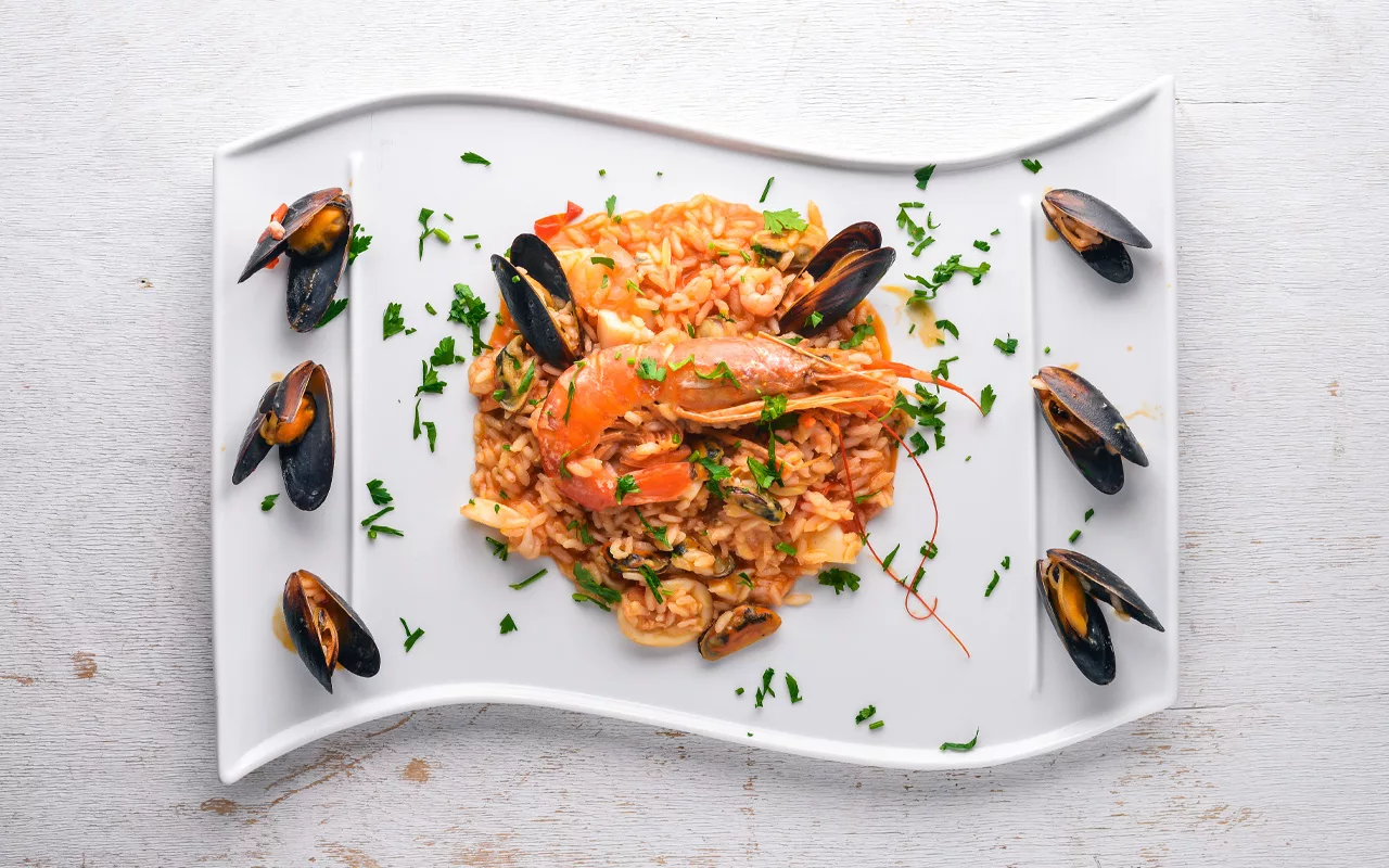 Seafood risotto with semi-dried tomatoes